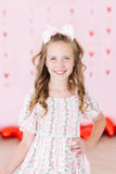 Rosebud Bows Smocked Ruffle Dress